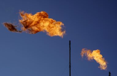 Flares burn off methane and other hydrocarbons at an oil and gas facility in Texas